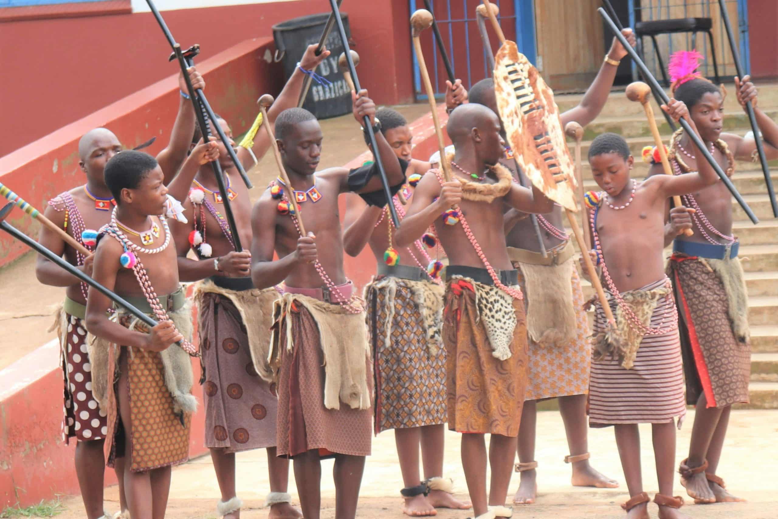 Young men dressed in tribal wear as part of cultural activities to do in Kruger Park